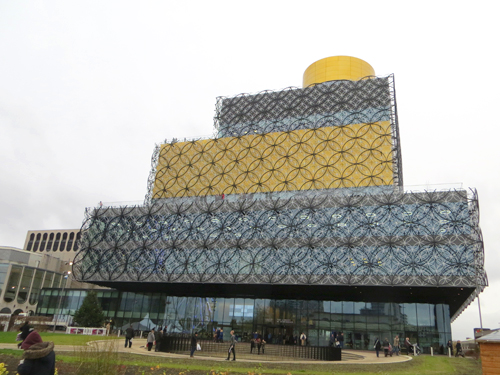 the Library of Birmingham Building from the front showing its distinctive cladding formed from circles of metal